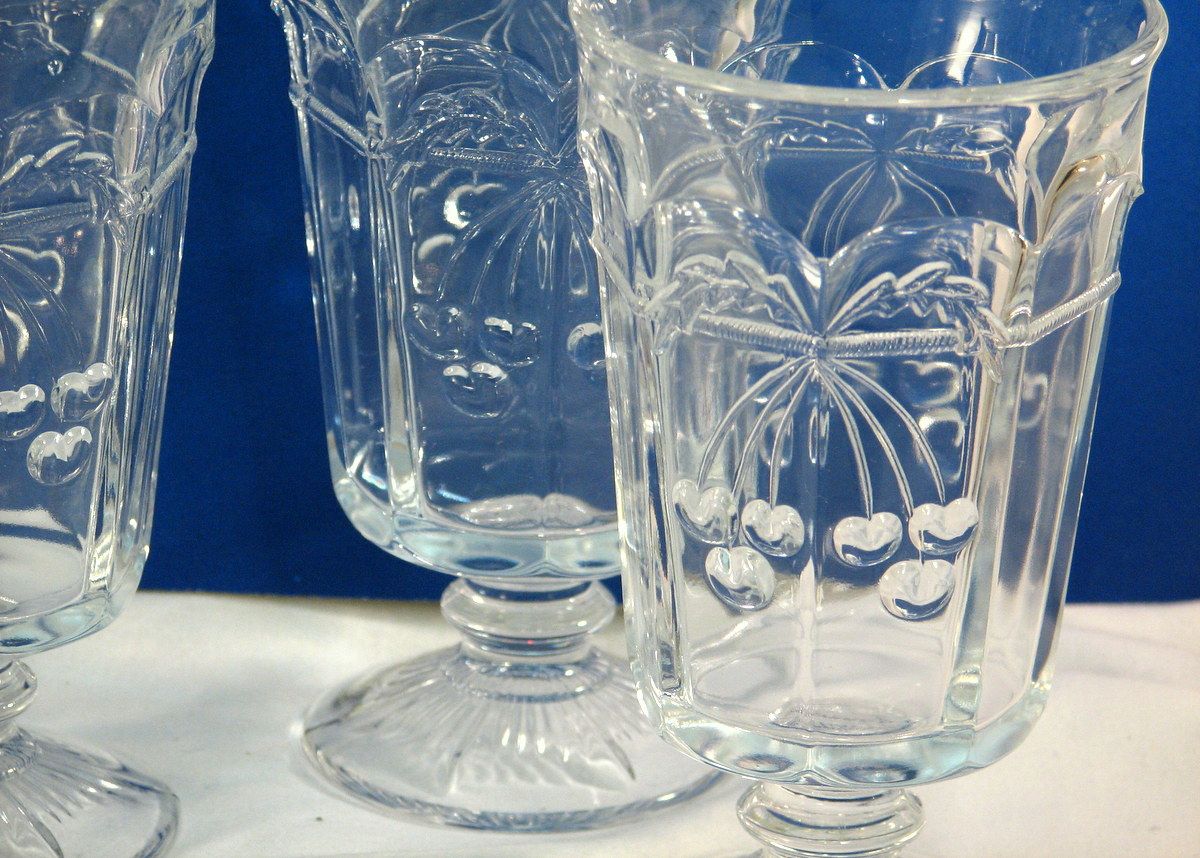 Embossed cherry pattern footed glassware