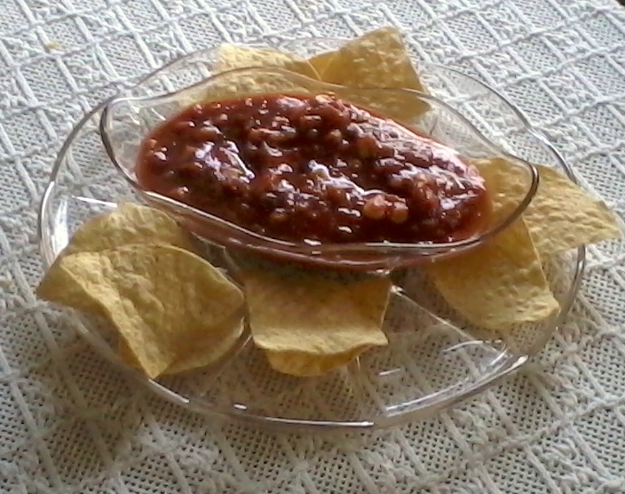 Enjoy salsa and chips in vintage glassware