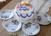 Birthday cake and vintage china plates