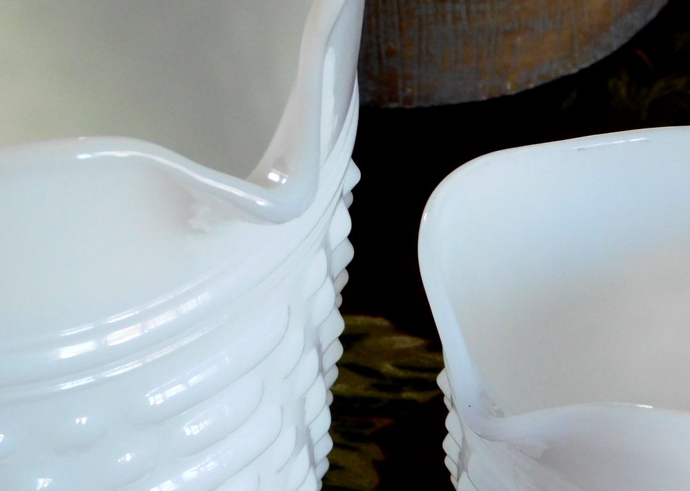 Hobnail milk glass pitchers in detail