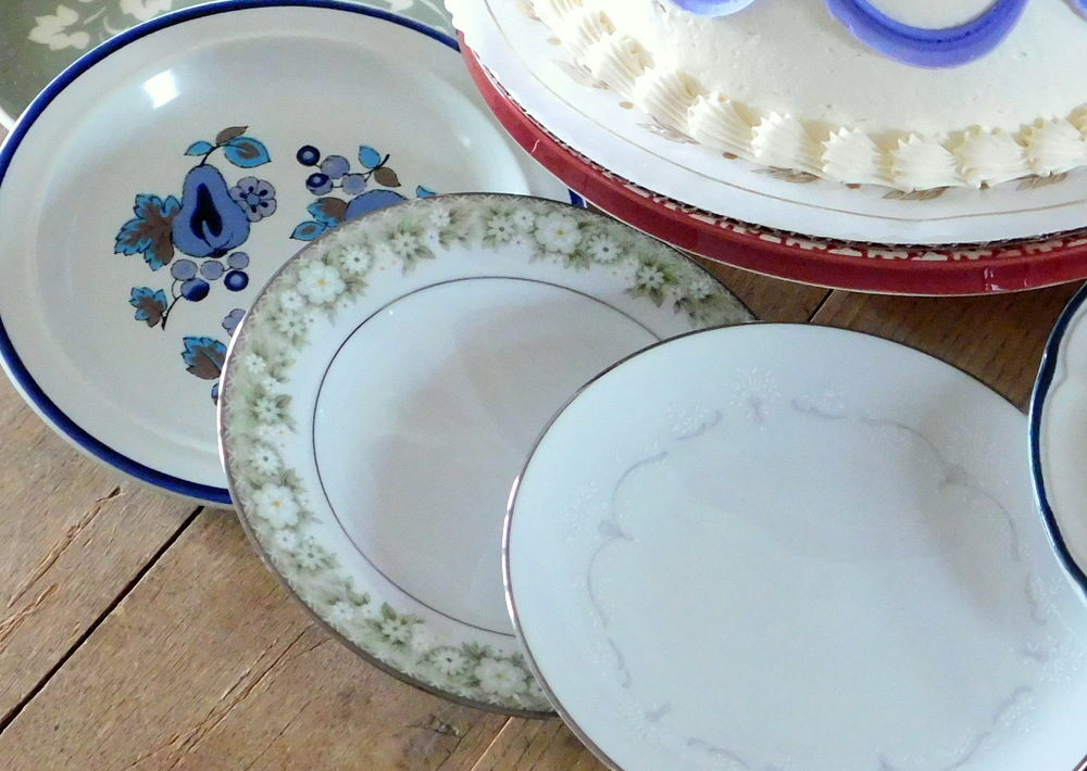Royal Doulton and Noritake vintage plates, candidates for serving the cake